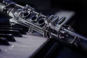 Clarinet laying a piano