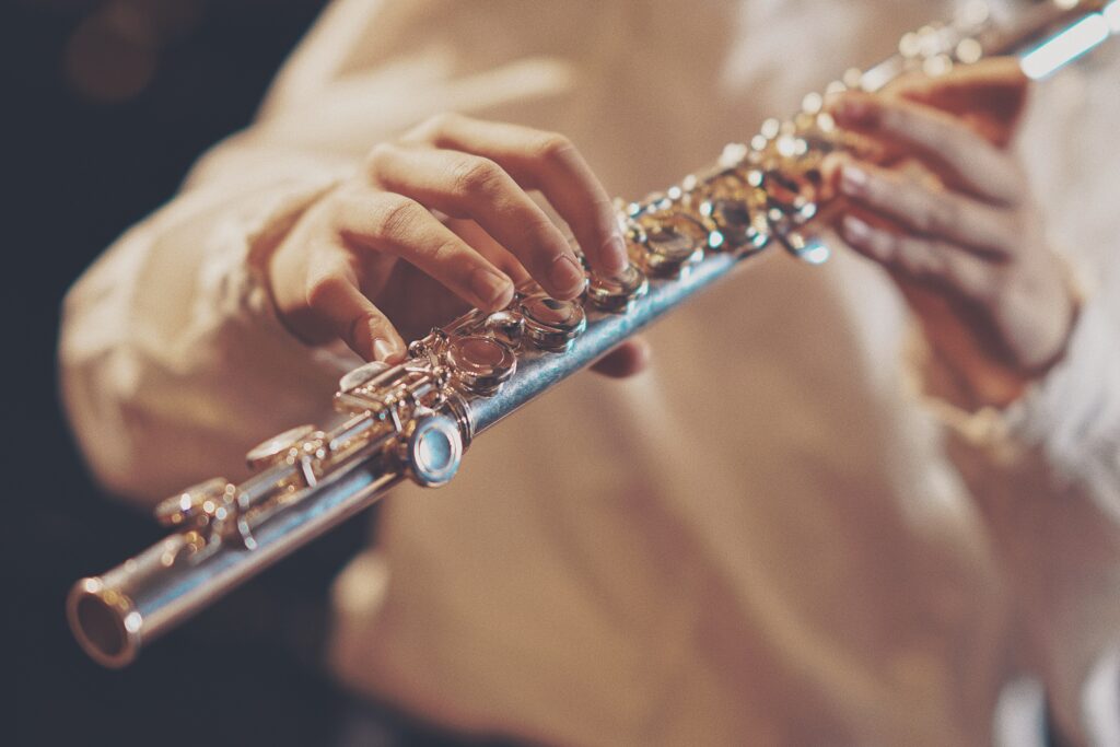 A closeup of a clarinet player performing