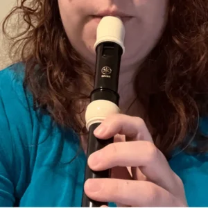 Front view of Hannah playing her Yamaha Recorder