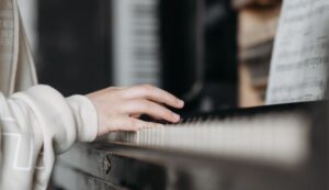 Student playing the piano