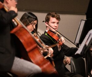 Violin players performing