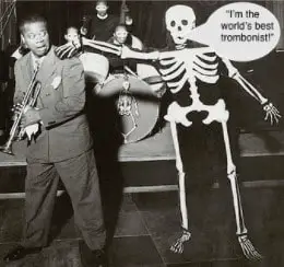 A skeleton saying that is the best trombonist to Louis Armstrong