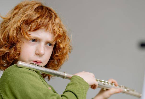 child playing the flute