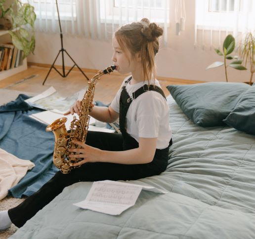 child playing the saxophone