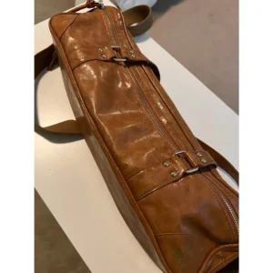 A brown Altieri Combo Traveler flute bag