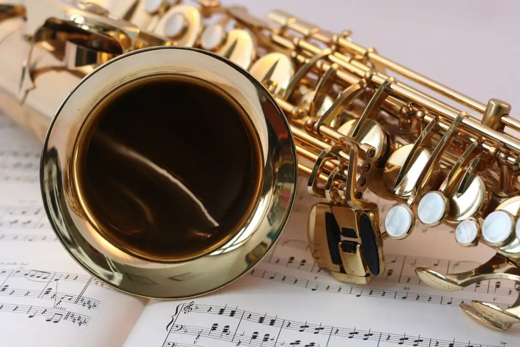 Saxophone lying on a music sheet